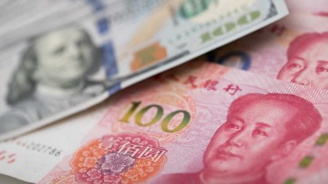 Chinas-yuan-trades-lower-against-US-dollar