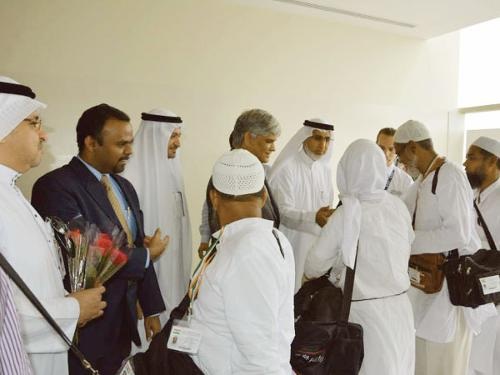 Indian Ambassador Hamid Ali Rao and Consul General B.S Mubarak receive the first batch of Indian pilgrims at Madinah’s Prince Muhammad International Airport, Wednesday. Officials from the Ministry of Haj, General Authority of Civil Aviation and Madinah airport as well as from the Indian Haj mission were also present to receive the pilgrims. — Courtesy photo 