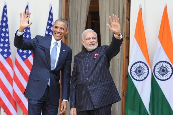 Indian Prime Minister Narendra Modi and US President Barack Obama wave to the media before their talks at the Hyderabad House in New Delhi.