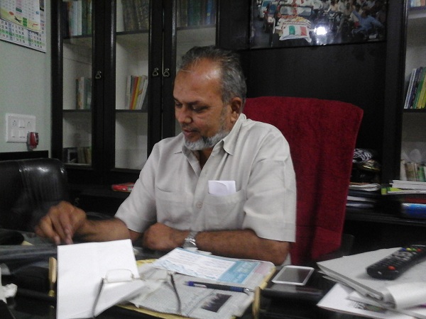 Mujtaba Farooq working at his office in Aurangabad, Maharashtra, Photo: Maeeshat 
