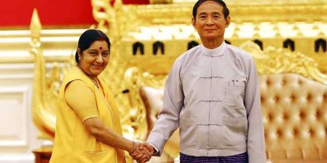 Myanmars-President-Win-Myint-right-shakes-with-visiting-Indian-External-Affairs-Minister-Sushma-Swaraj-during-their-meeting-at-the-President-House-in-Naypyitaw-Myanmar.jpg