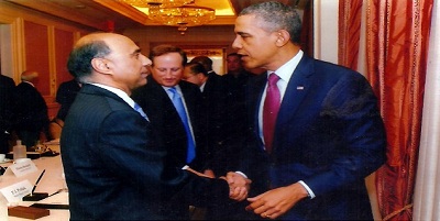 Frank Islam (left) shaking hands with US President Barack Obama at White House