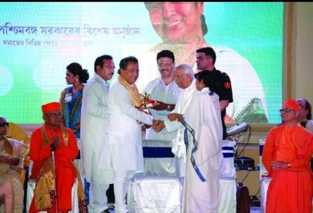 M Nurul Islam receiving the prestigious ” Banga Bhushan Award” from Mamata Banerjee , the chief minister of West Bengal and Governor Keshari Nath Tripathi