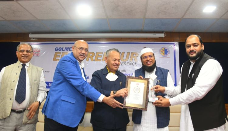 Mahbubul-Hoque-Chancellor-of-USTM-receiving-Maeeshat-Edu-Doctor-Award-2022-from-the-hands-of-P.-A.-Inamdar-Founder-President-Azam-Campus-Pune-centre-at-Golmez-Edupreneur-Conference-750x430-1.jpeg