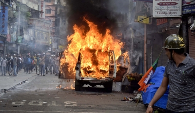Kolkata witnesses pitched battles between BJP workers and police, PCR van torched