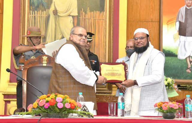 Meghalaya Governor Satya Pal Malik presenting the Governor’s Award for Excellence in Public Service to Mahbubul Hoque